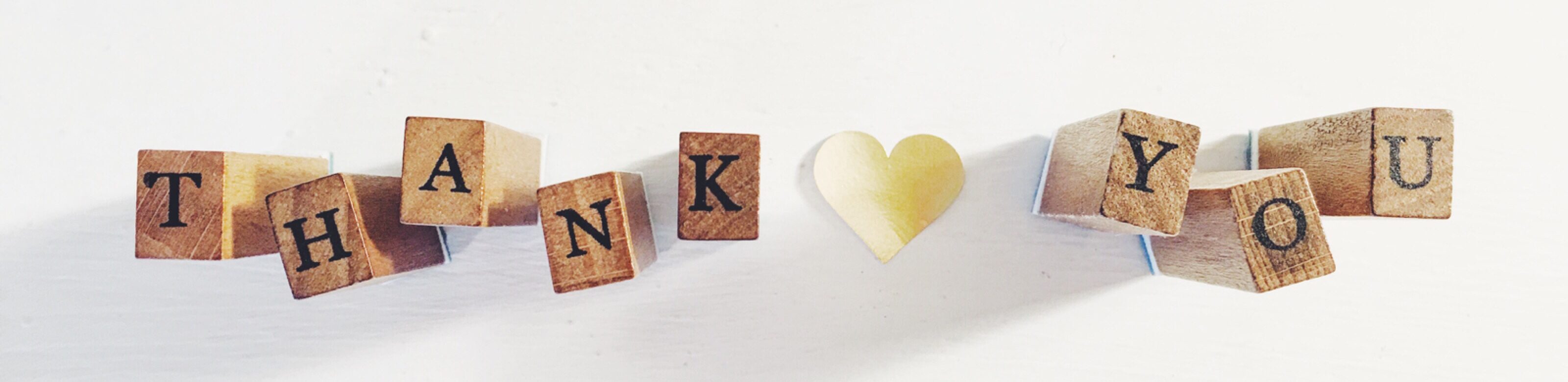 Thank you text written in Scrabble letters