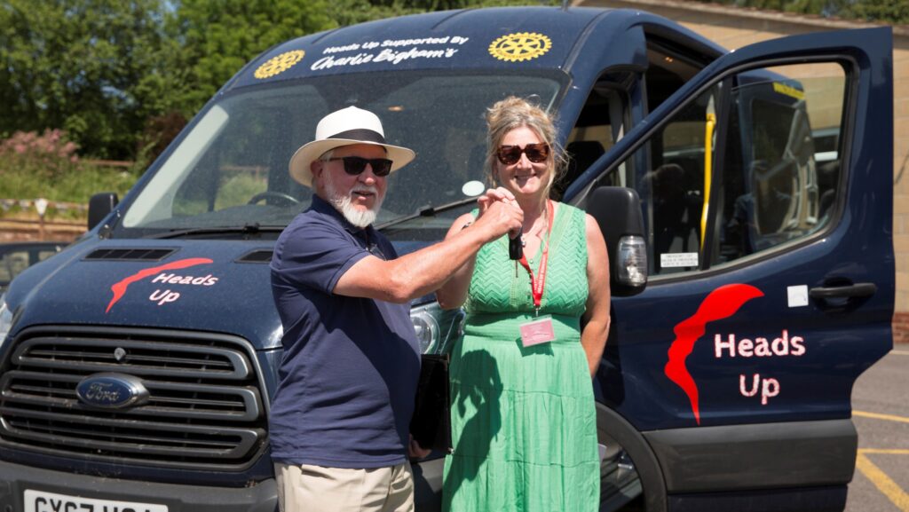 Bridget Harvey and Alan Webb with new minibus